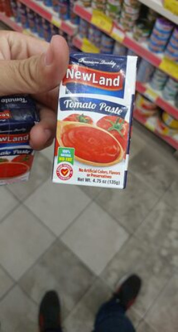 معجون طماطم نيولاند